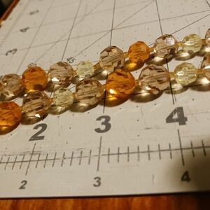 Beautiful orange and Crystal colored necklace